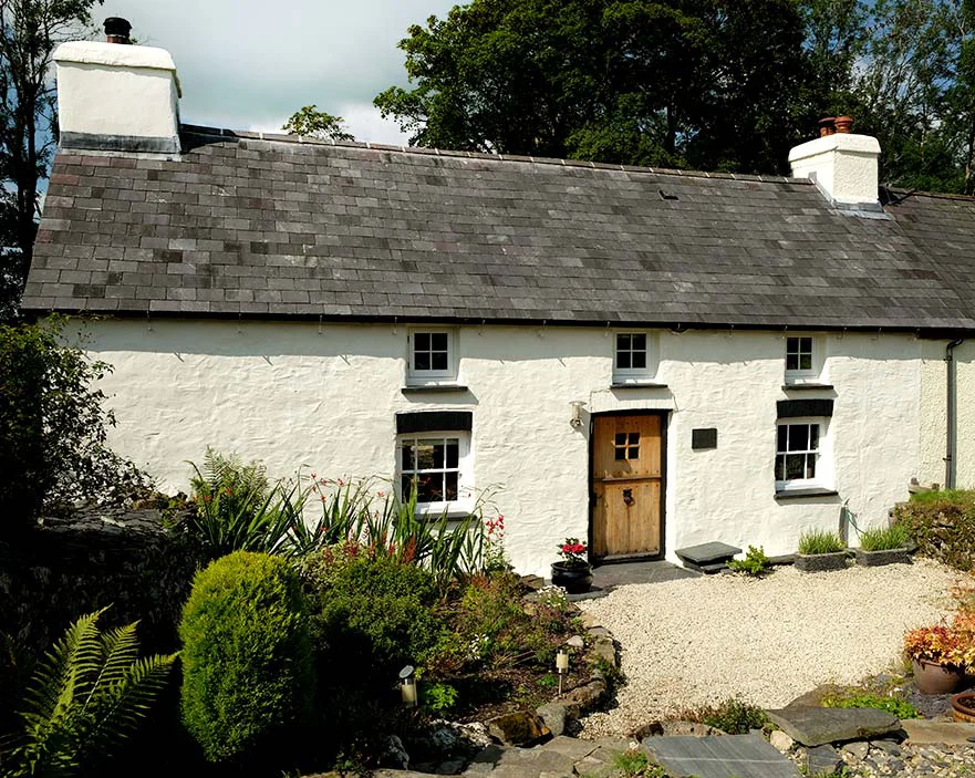 Our Welsh Cottage Exterior Melanie and Nicholas's charming old Welsh cottage exterior, showcasing its architecture and surroundings.